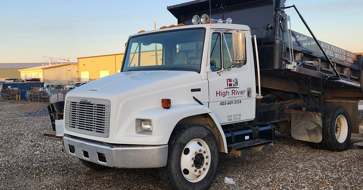 Single axle dump truck with up to 6 yards of landscape delivery